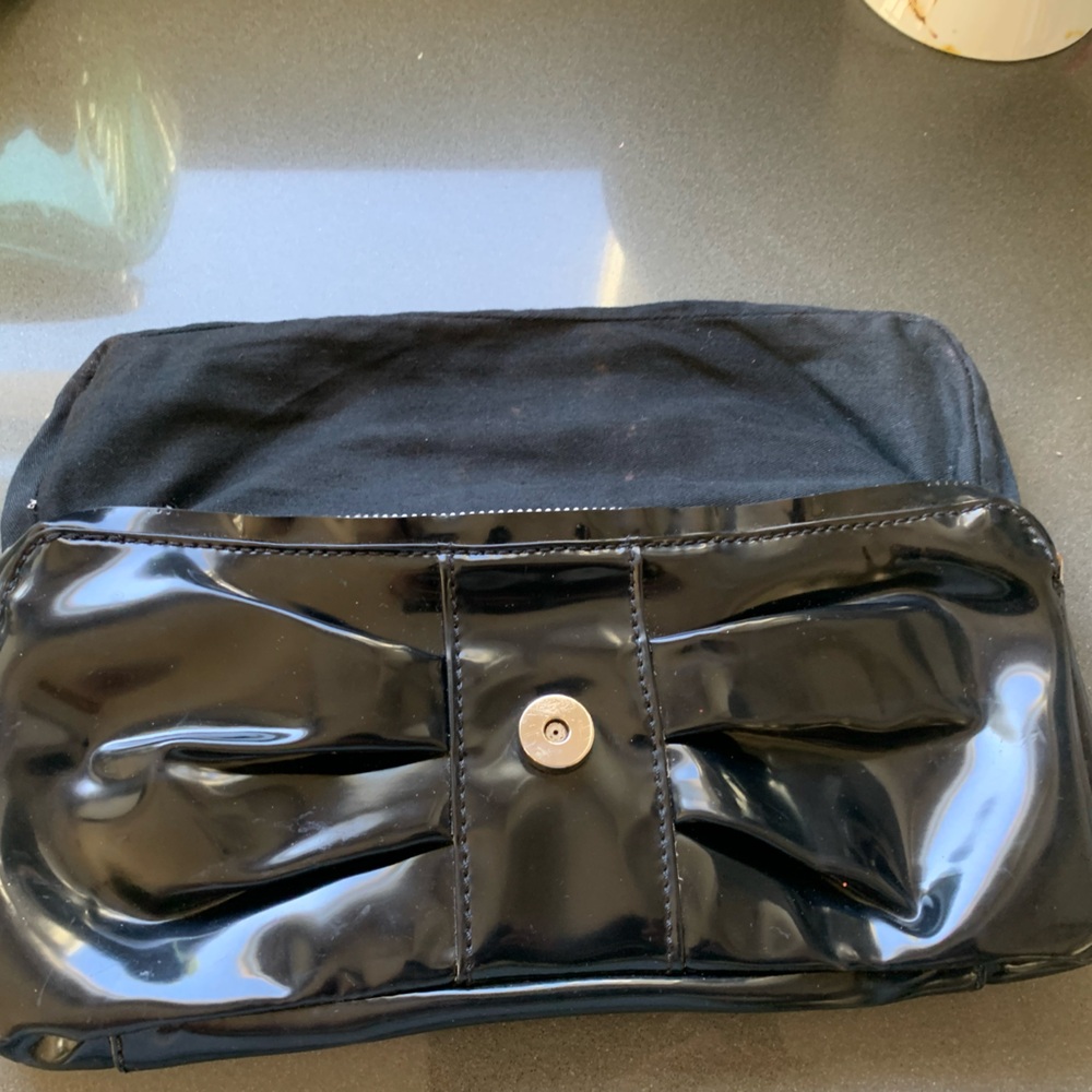 Armani exchange black patent leather formal bag.